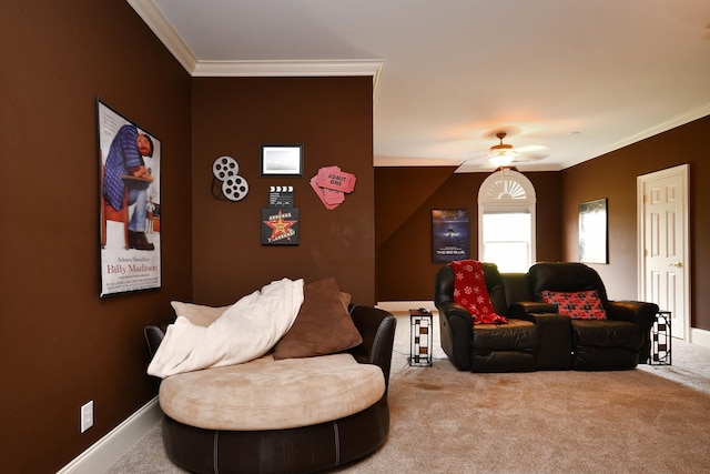 living room featuring carpet flooring, ceiling fan, and ornamental molding