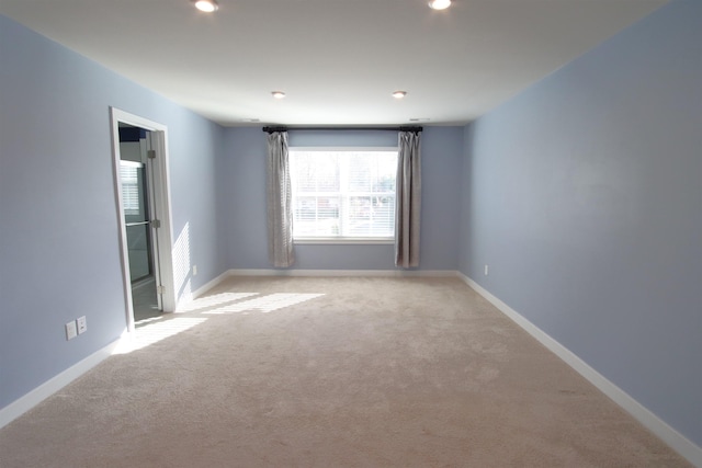 view of carpeted spare room