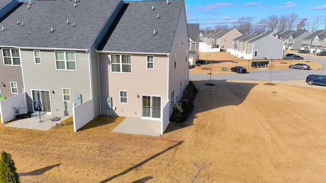 rear view of house featuring a patio