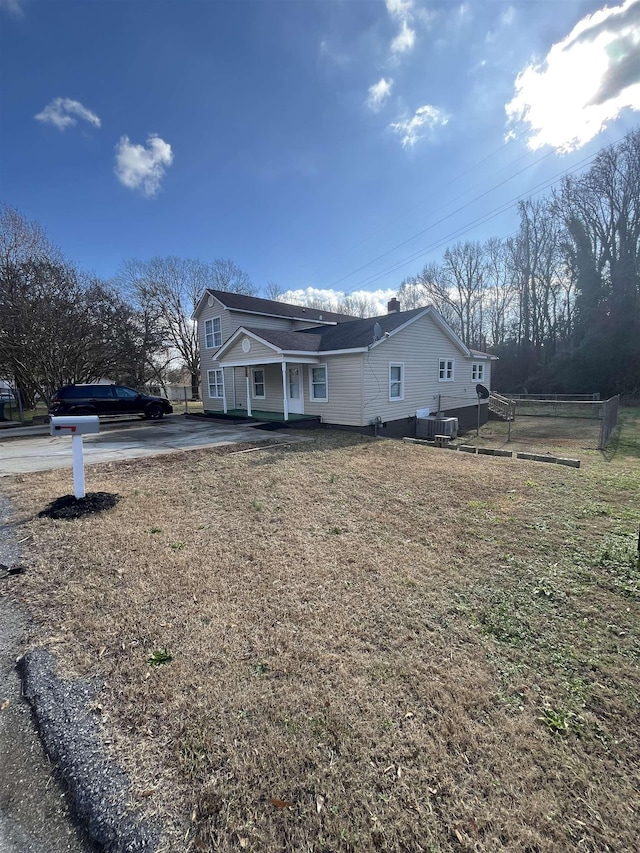 view of home's exterior featuring a yard