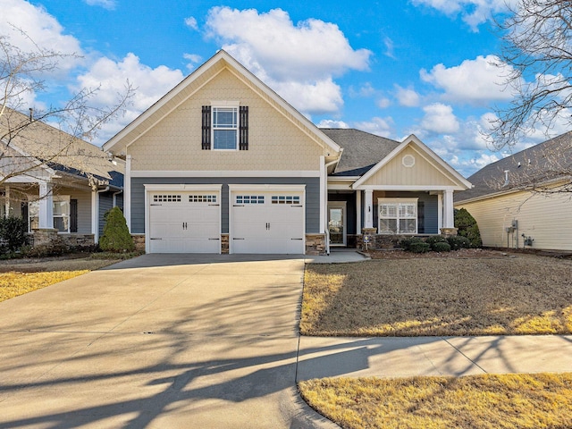 craftsman-style home with a garage