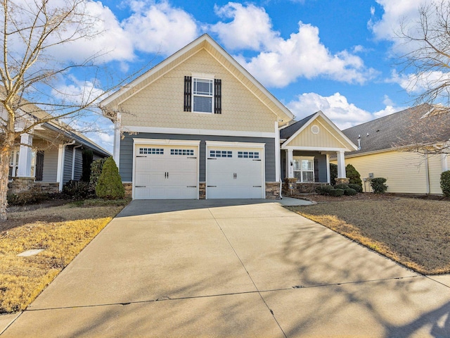 view of front of property with a porch and a garage