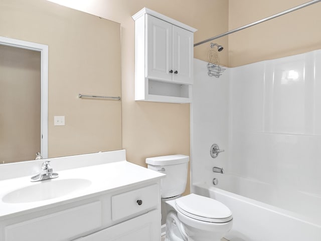 full bathroom with shower / bathing tub combination, vanity, and toilet