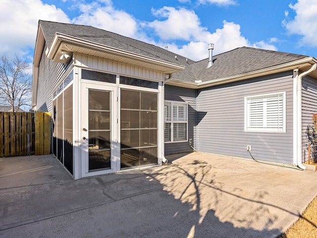 rear view of property with a patio area