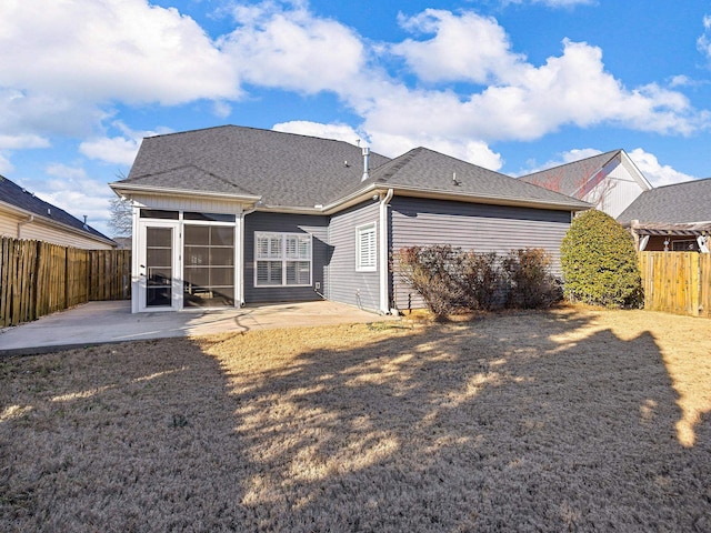 rear view of property featuring a patio