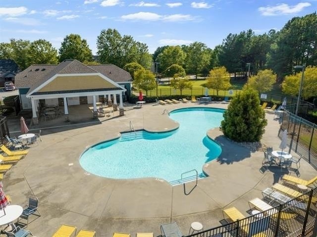 view of swimming pool featuring a patio