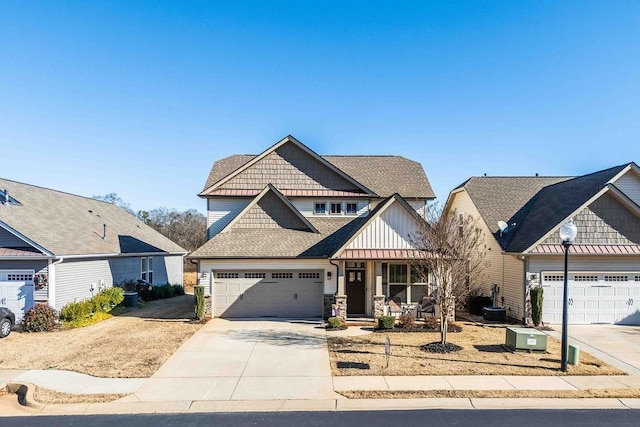 view of front of home with a porch and a garage