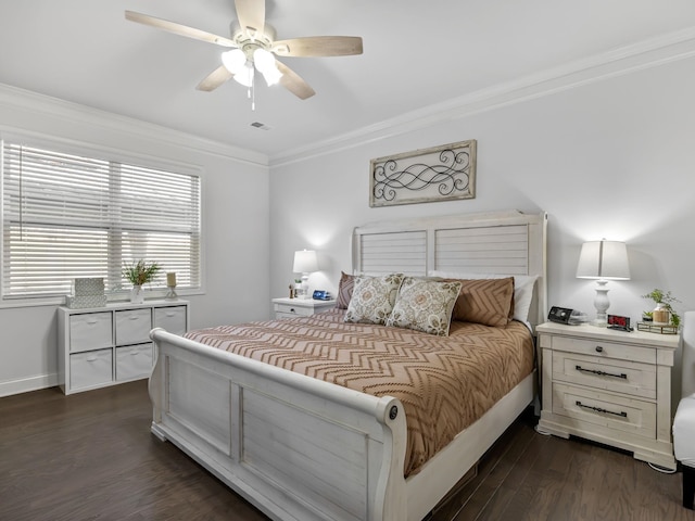 bedroom featuring dark hardwood / wood-style flooring, ceiling fan, and crown molding