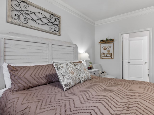 bedroom featuring crown molding