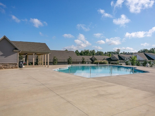 view of pool featuring a patio