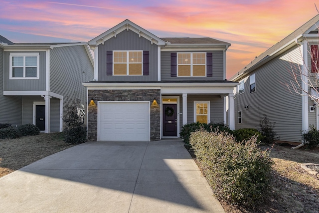 front of property with a garage