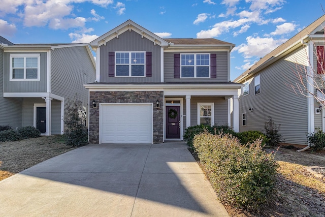 view of front of property with a garage