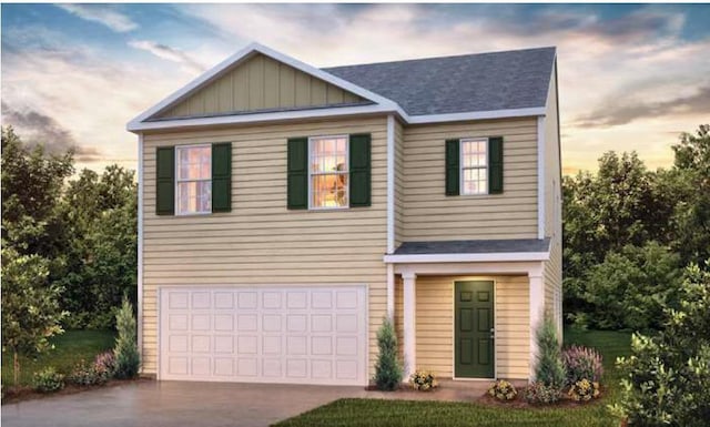 view of front of home with a garage