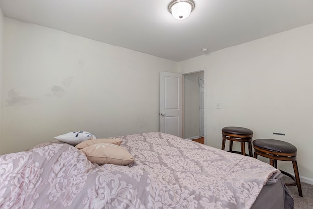 bedroom featuring carpet