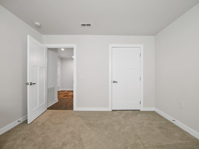 unfurnished bedroom with carpet