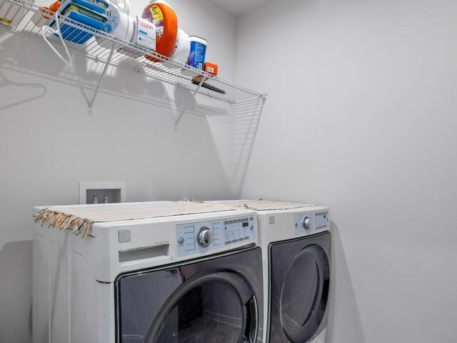 washroom featuring separate washer and dryer