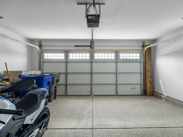 garage featuring a garage door opener