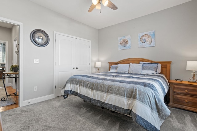 bedroom with carpet flooring, ceiling fan, and a closet