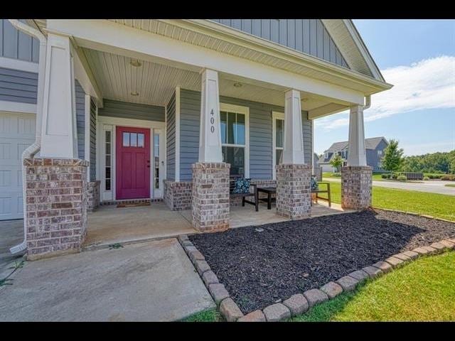 property entrance with a porch