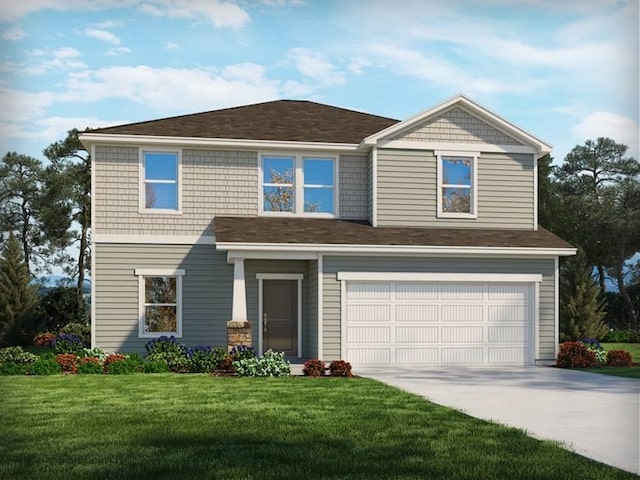 view of front of property featuring a garage and a front yard