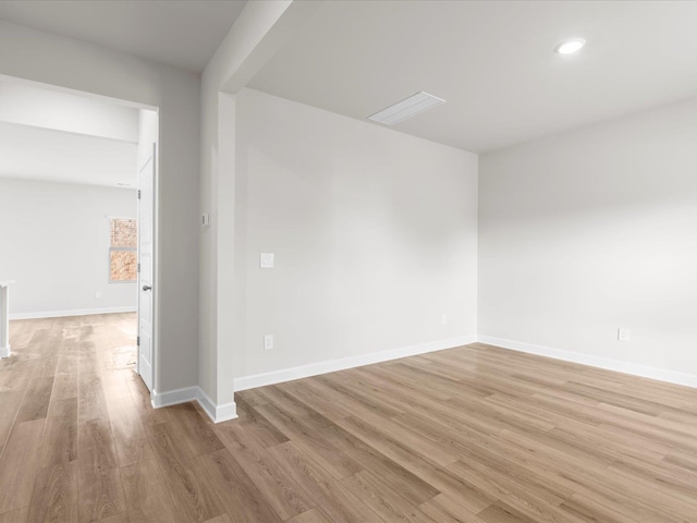 unfurnished room featuring light hardwood / wood-style flooring