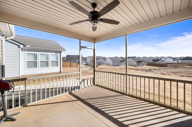 exterior space featuring ceiling fan