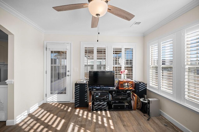 interior space featuring ceiling fan, hardwood / wood-style floors, and ornamental molding