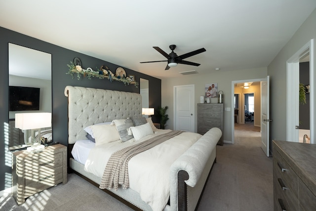 carpeted bedroom featuring ceiling fan