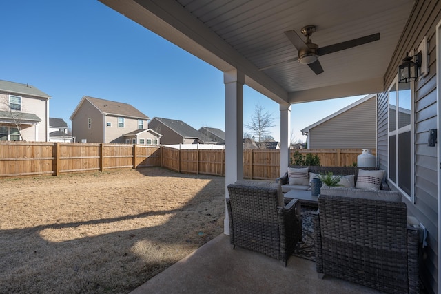 view of patio / terrace featuring ceiling fan and an outdoor living space