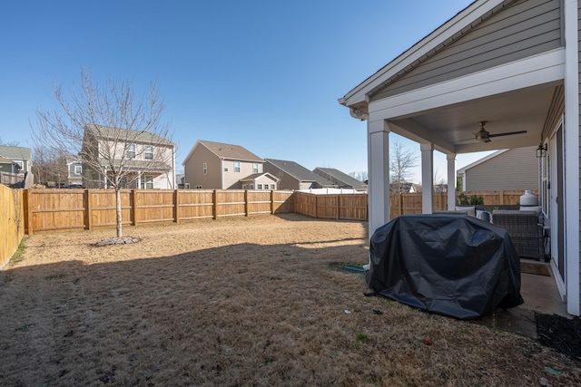 view of yard featuring ceiling fan