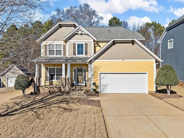 craftsman house with a porch and a garage