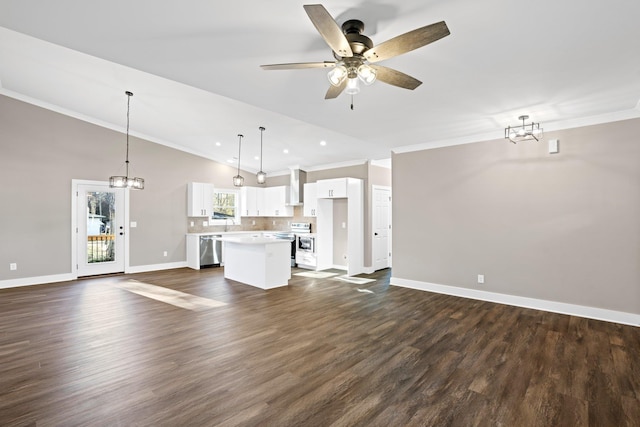 unfurnished living room with ceiling fan with notable chandelier, dark wood-type flooring, vaulted ceiling, and crown molding