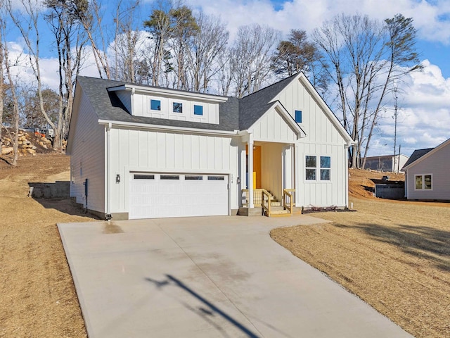 modern inspired farmhouse featuring a garage