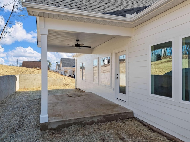 view of patio featuring ceiling fan