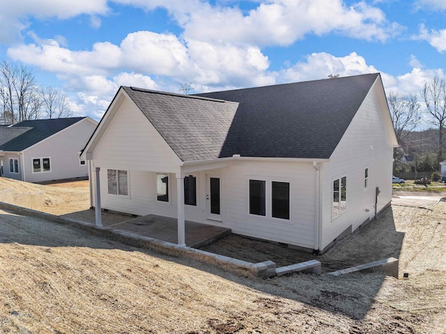 back of property featuring a patio