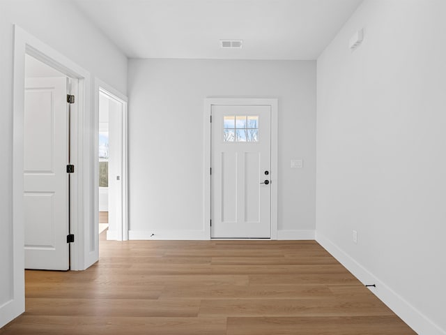 entryway with light hardwood / wood-style flooring