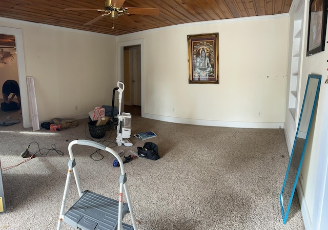 interior space featuring carpet floors, ceiling fan, and wood ceiling