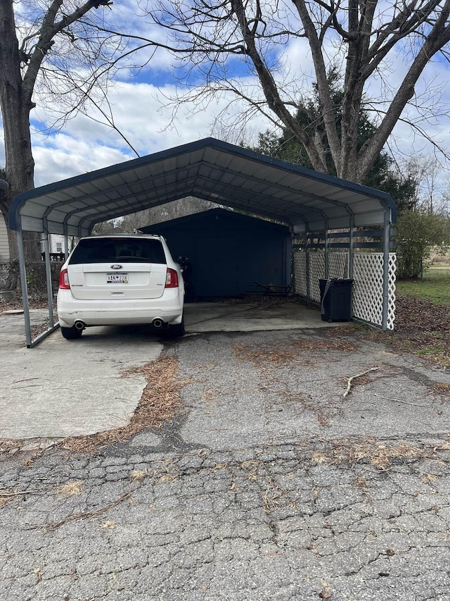 view of car parking with a carport