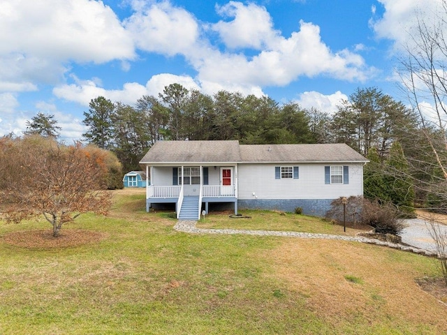 view of front of house featuring a porch and a front yard