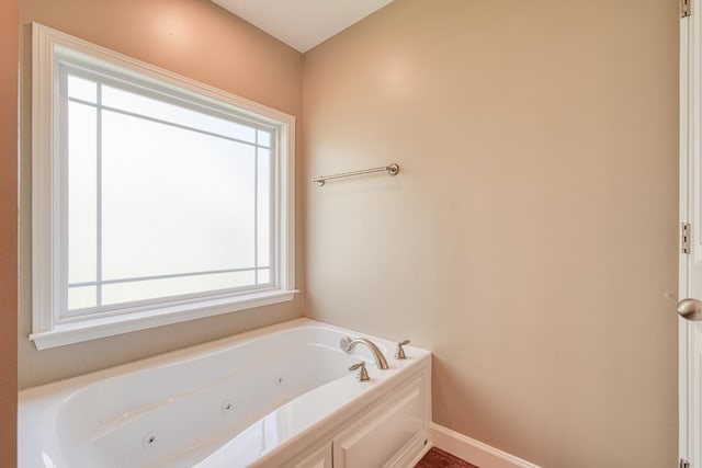 bathroom with a tub