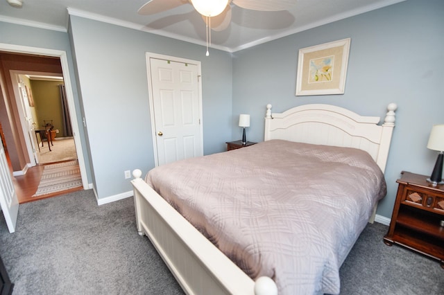 carpeted bedroom with ceiling fan and crown molding