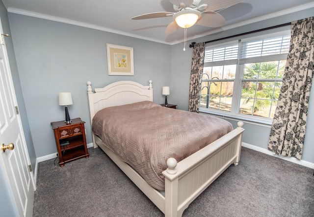 carpeted bedroom with ceiling fan and ornamental molding