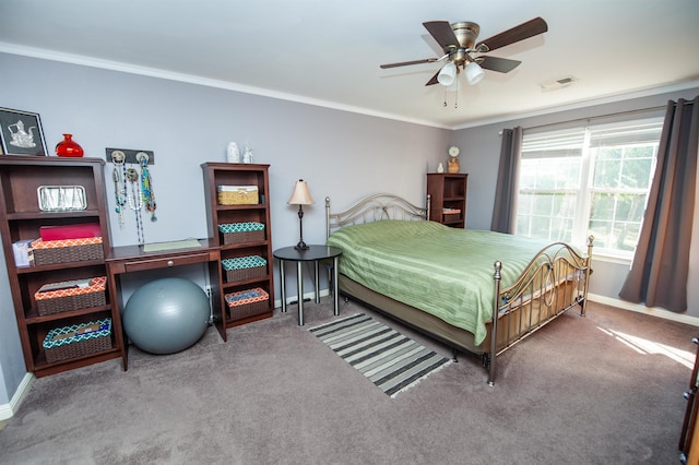 carpeted bedroom with ceiling fan and crown molding