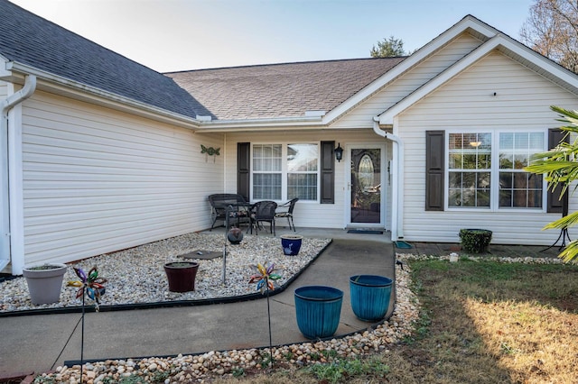 rear view of house featuring a patio