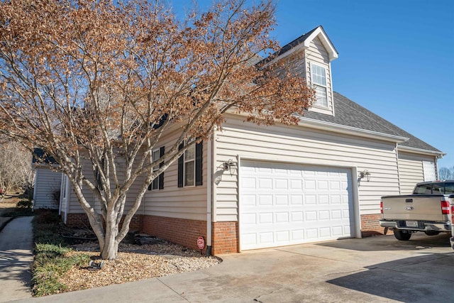 view of property exterior with a garage