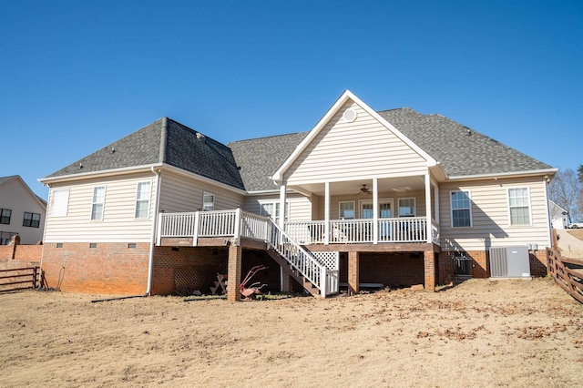 back of house with central air condition unit and ceiling fan