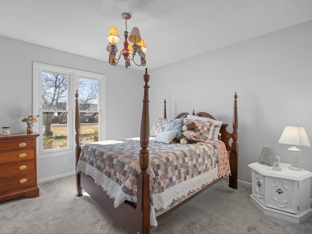 carpeted bedroom with a textured ceiling, an inviting chandelier, and multiple windows