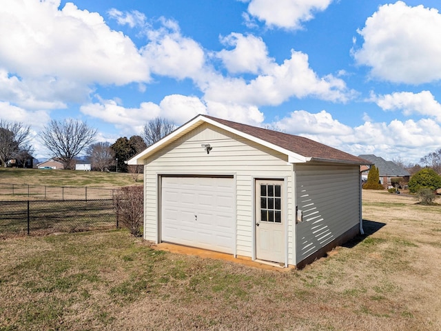 garage with a lawn