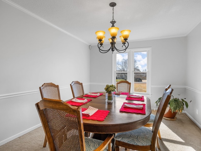 dining area featuring crown molding, carpet, and an inviting chandelier