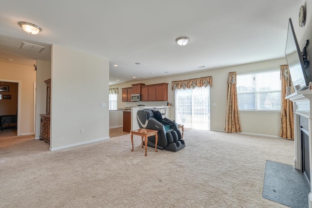 living room with light colored carpet